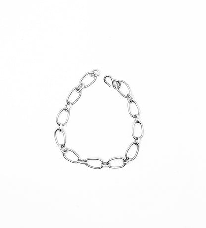 Radiant Linkage: Handcrafted Sterling Silver Oval Chain Bracelet