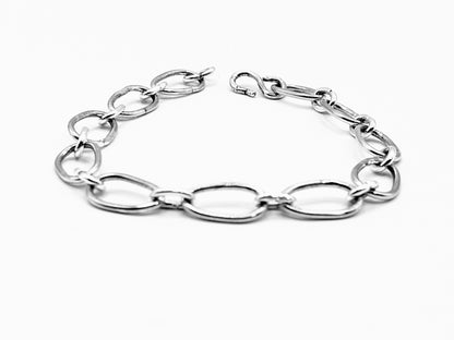 Radiant Linkage: Handcrafted Sterling Silver Oval Chain Bracelet