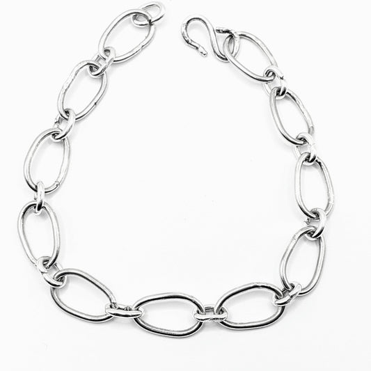 Radiant Linkage: Handcrafted Sterling Silver Oval Chain Bracelet
