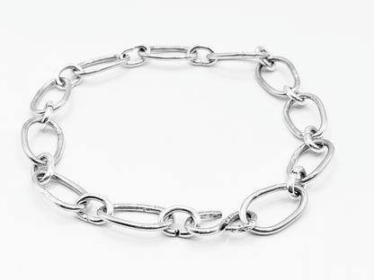 Radiant Linkage: Handcrafted Sterling Silver Oval Chain Bracelet