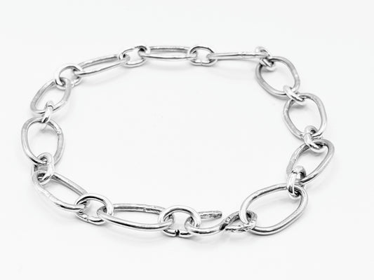 Radiant Linkage: Handcrafted Sterling Silver Oval Chain Bracelet