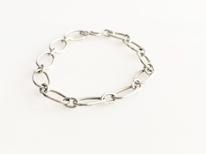 Radiant Linkage: Handcrafted Sterling Silver Oval Chain Bracelet
